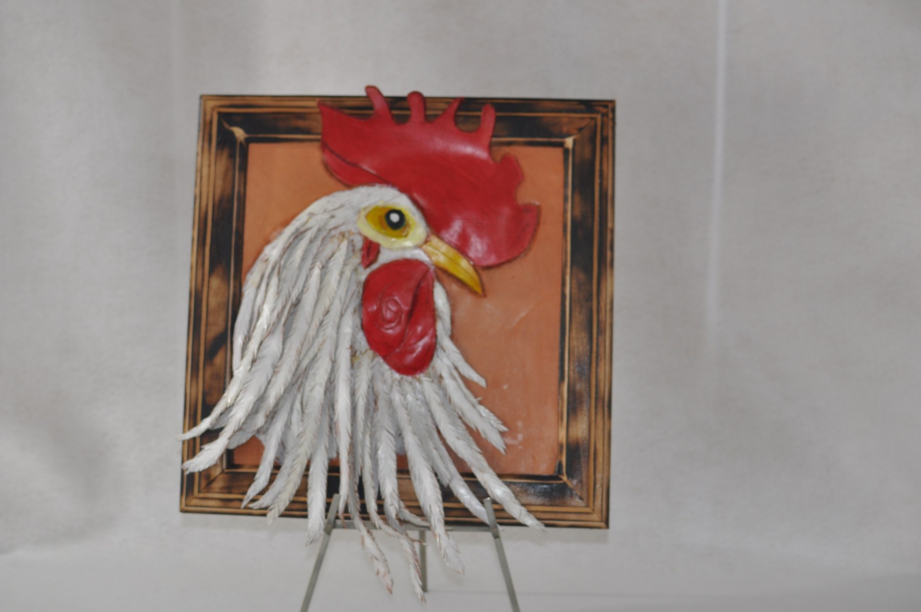 Every feather, carved by hand